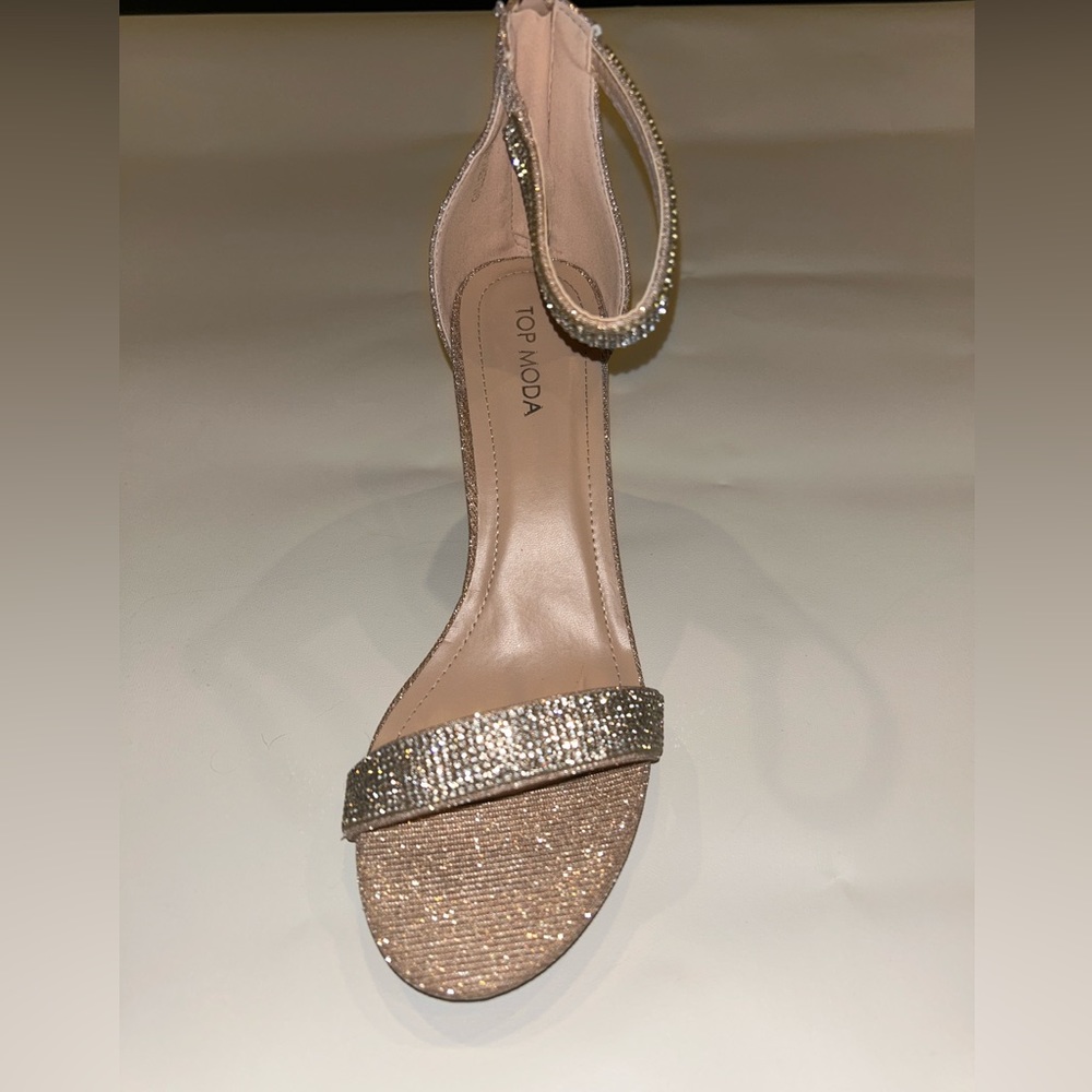Gold sparkly ankle strap heels